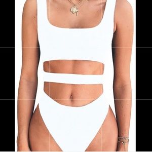 white body suit with cut outs on stomach